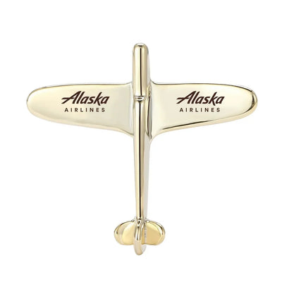 Alaska Airlines Airplane Shape aviation airplane-shape brooch, polished alloy body with engraved detail.