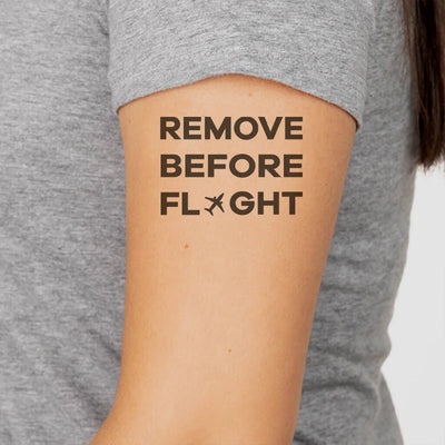 Remove Before Flight aviation temporary tattoo in skin-safe adhesive paper.