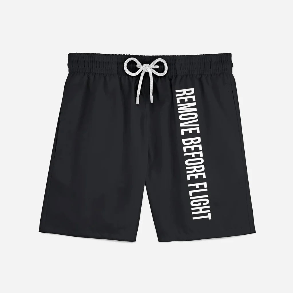 Remove Before Flight 2 (Black) aviation design on quick-dry polyester swim trunks.