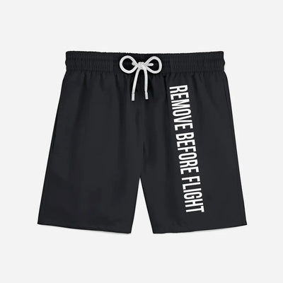Remove Before Flight 2 (Black) aviation design on quick-dry polyester swim trunks.
