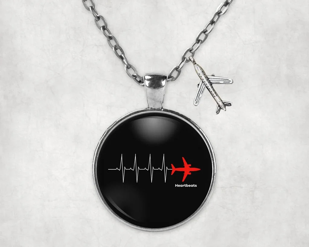 Side view of Aviation Heartbeats aviation necklace in stainless steel, polished finish.