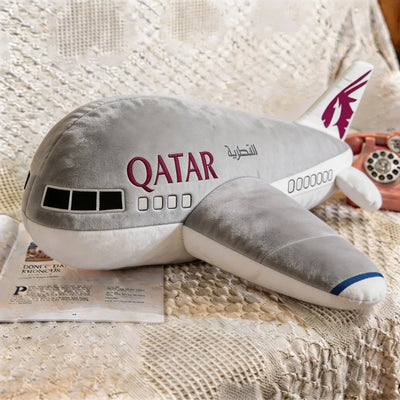 Qatar Airways aviation design on soft polyester filling airplane-shape decorative pillow.