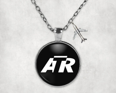 ATR & Text aviation necklace, stainless steel body with engraved detail.
