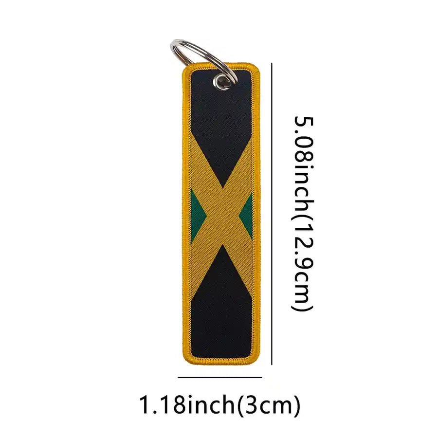 Jamaica Flag aviation Remove Before Flight key chain, aviation-tag style webbing.