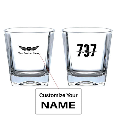 Boeing 737 aviation design on whiskey glass, crystal-clear premium glassware.