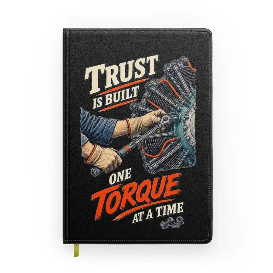 Trust Is Built One Torque At A Time design on black notebook