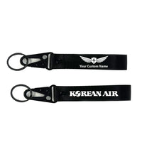 Thumbnail for Korean Airlines aviation hawk-shaped key chain, durable metal alloy.