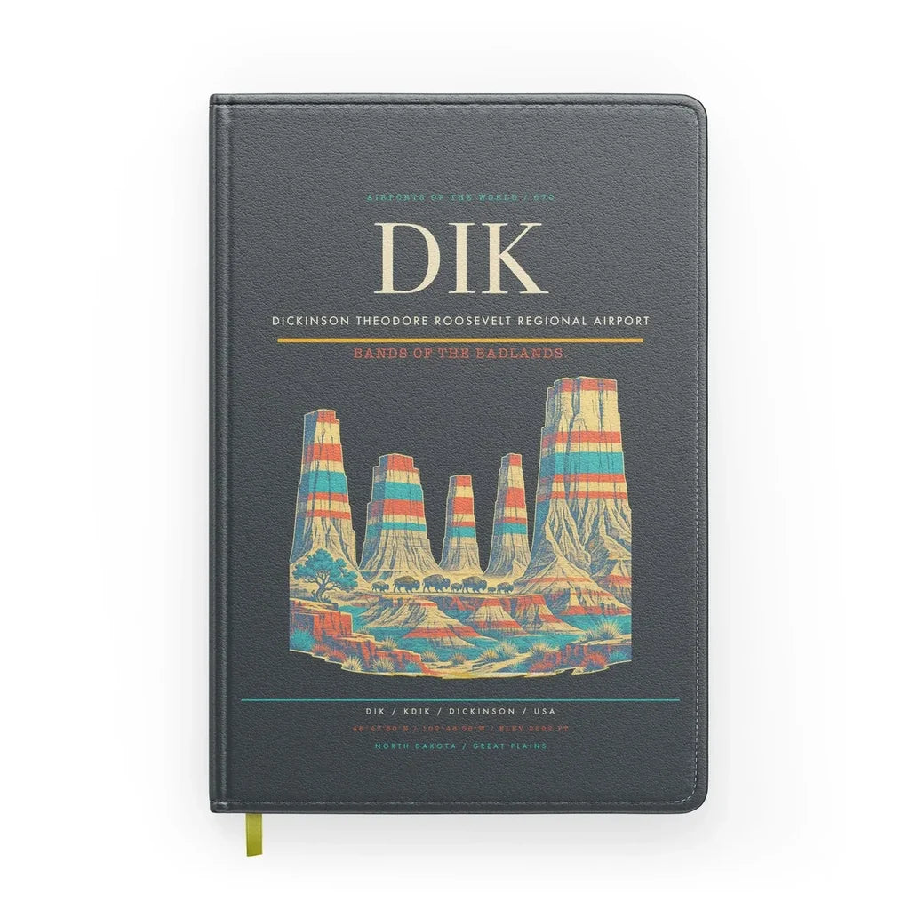 Dickinson Theodore Roosevelt Regional Airport (DIK) design on gray notebook