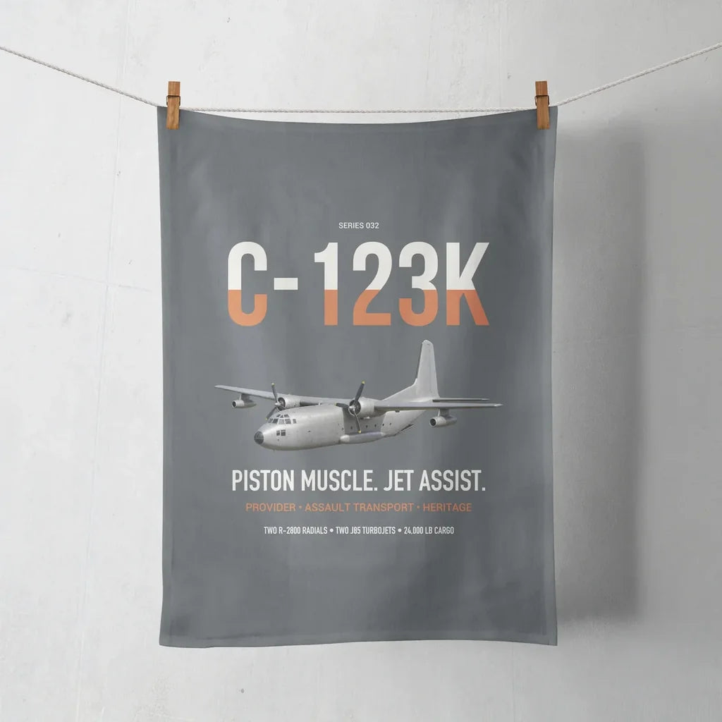 C-123K Provider design on gray towel