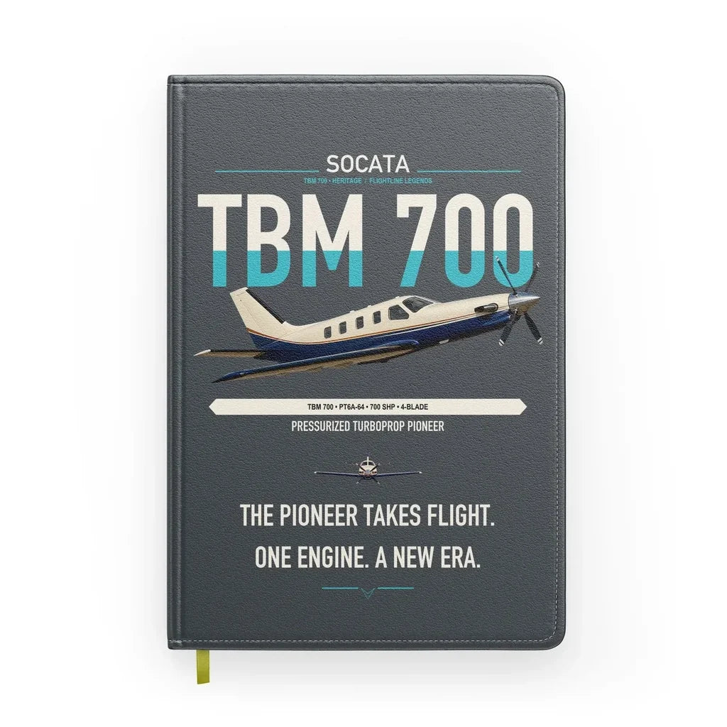 Socata TBM 700 design on gray notebook