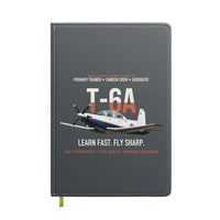 Thumbnail for T-6A Texan II Train The Next Generation design on gray notebook