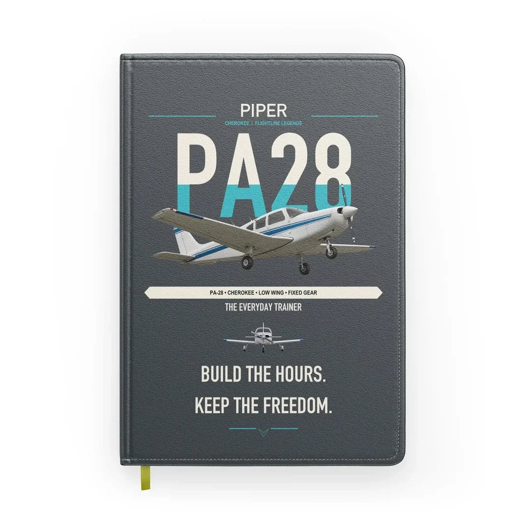 Piper PA-28 Cherokee design on gray notebook