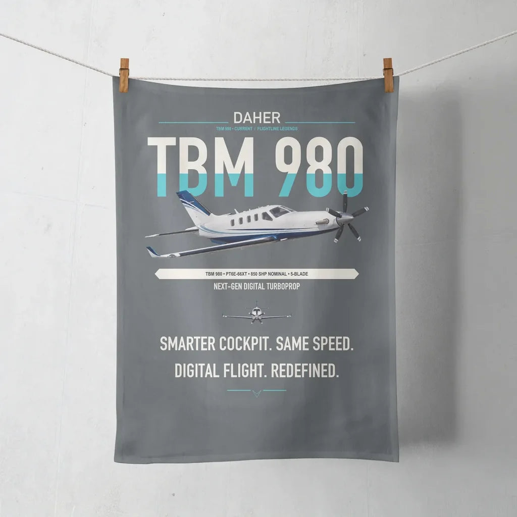 Daher TBM 980 design on gray towel