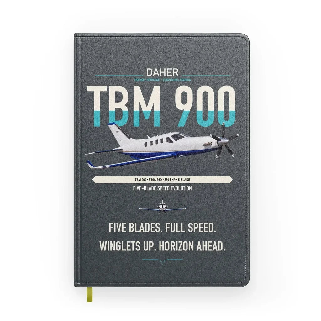 Daher TBM 900 design on gray notebook