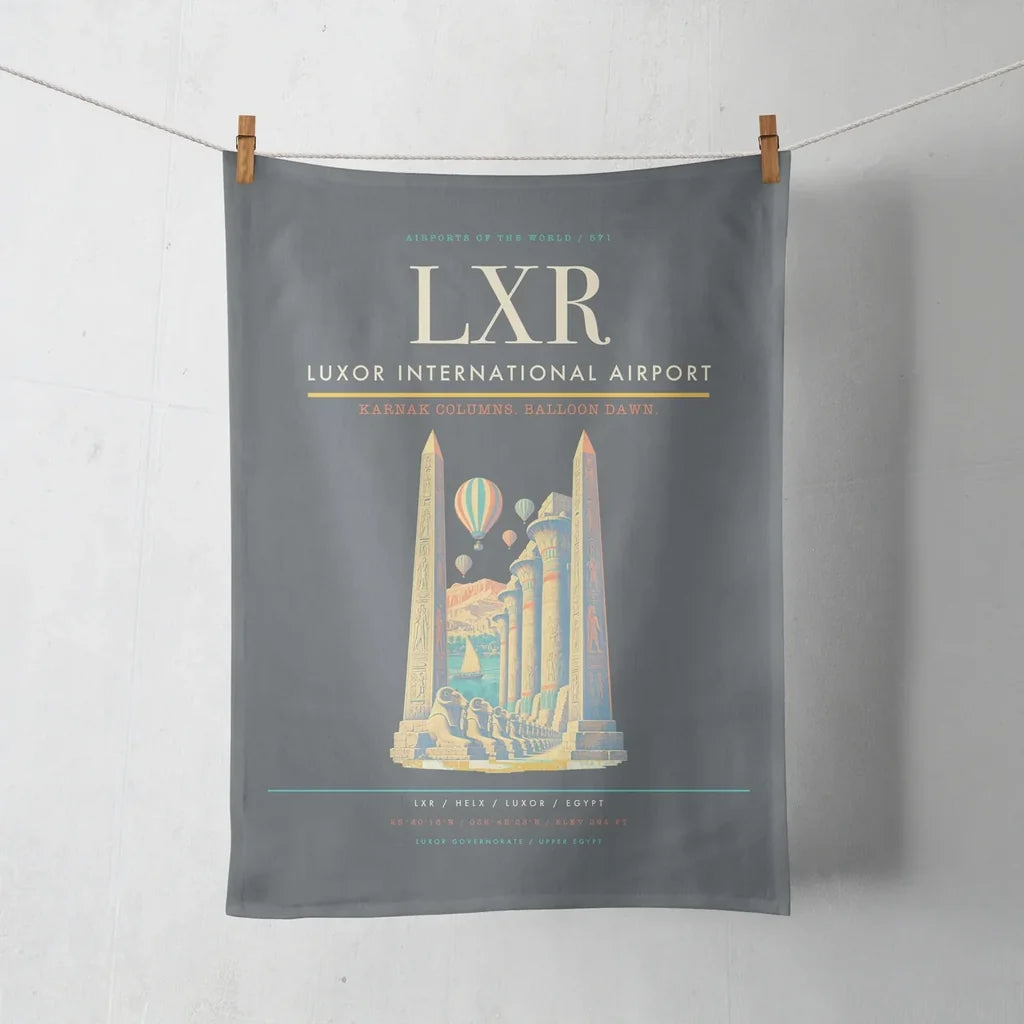 Luxor International Airport (LXR) design on gray towel