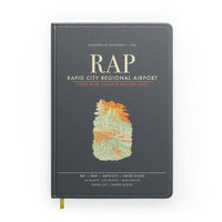 Thumbnail for Rapid City Regional Airport (RAP) design on gray notebook
