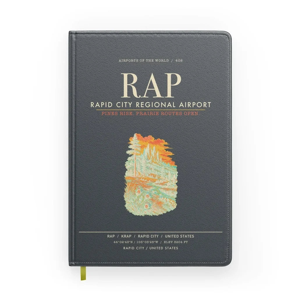 Rapid City Regional Airport (RAP) design on gray notebook