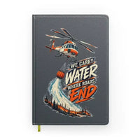Thumbnail for We Carry Water Where Roads End design on gray notebook
