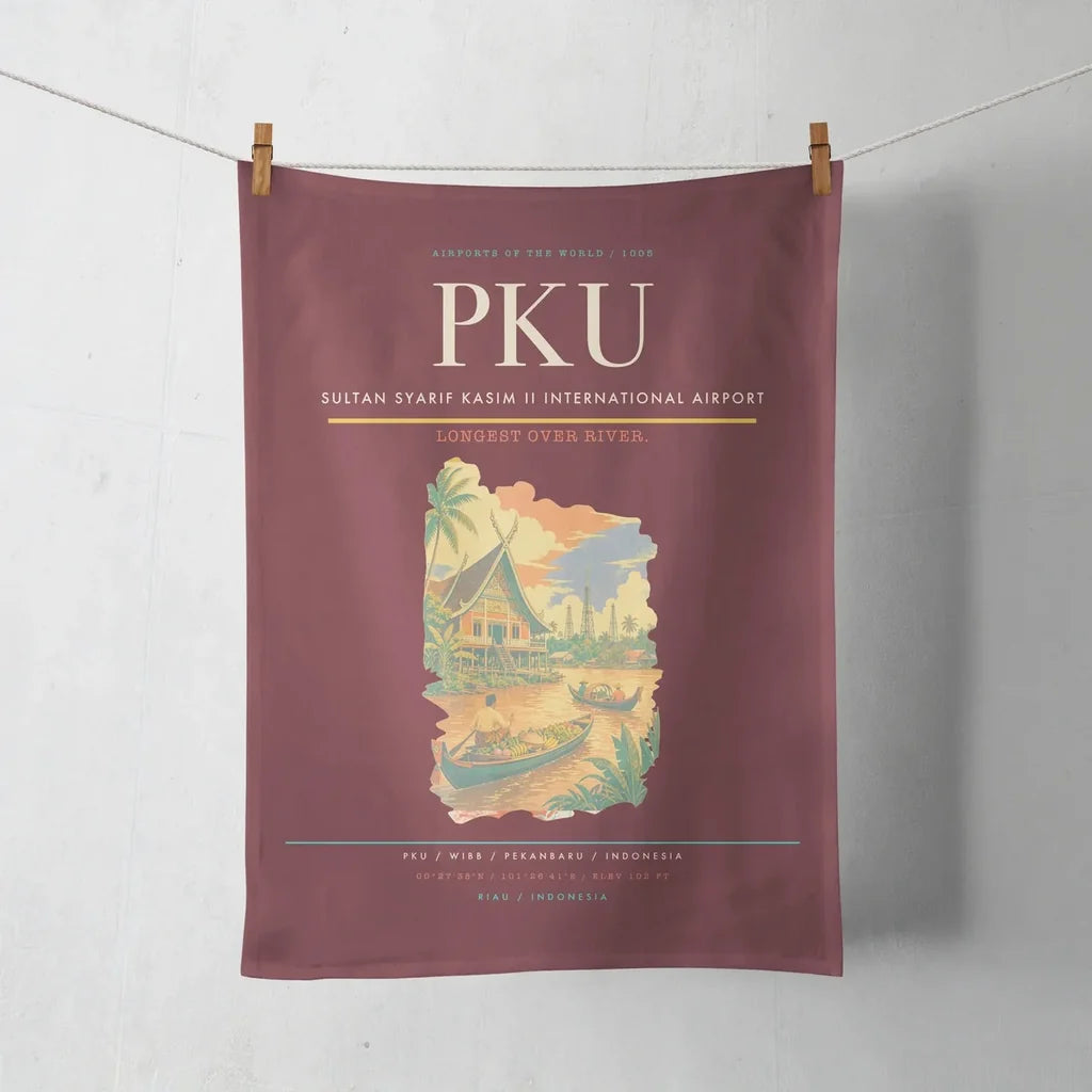 Sultan Syarif Kasim II International Airport (PKU) design on dark red towel