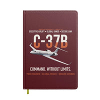 Thumbnail for C-37B Global Command Link design on dark red notebook