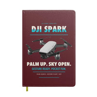 Thumbnail for DJI Spark design on dark red notebook