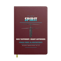 Thumbnail for Ascent AeroSystems Spirit design on dark red notebook