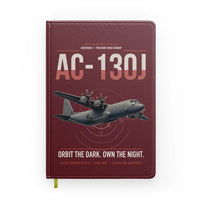 Thumbnail for AC-130J Ghostrider design on dark red notebook