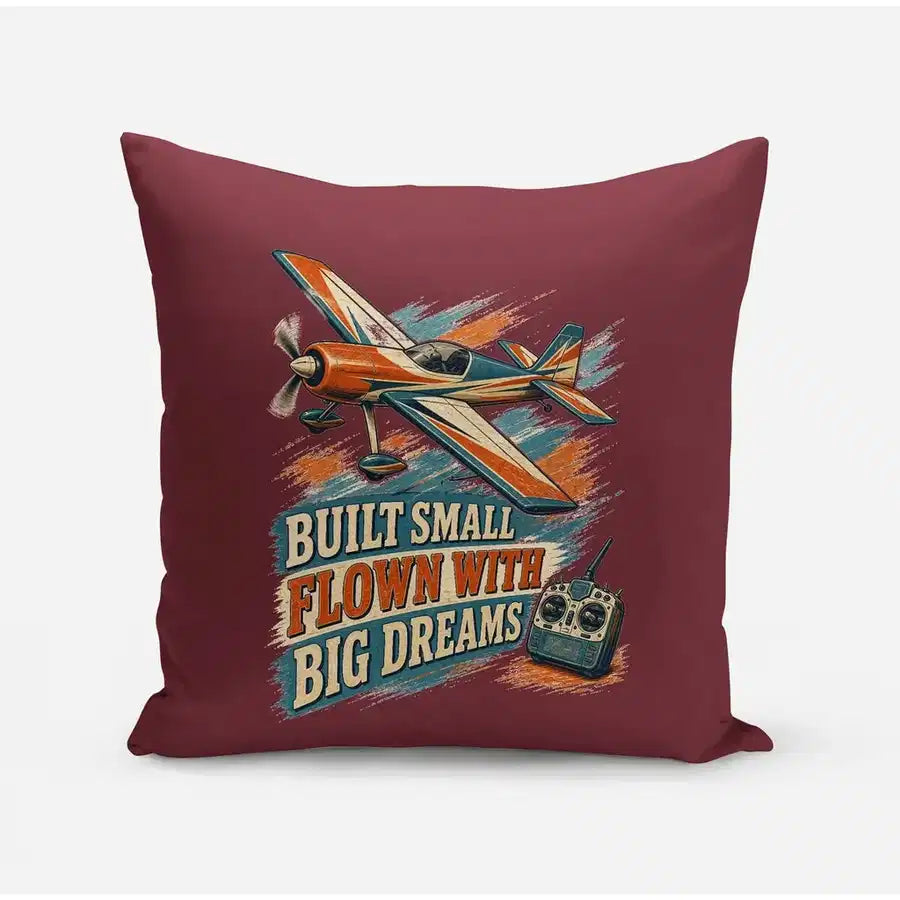 Built Small Flown With Big Dreams design on dark red pillow