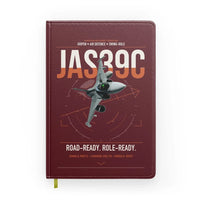 Thumbnail for Saab JAS 39C Gripen design on dark red notebook