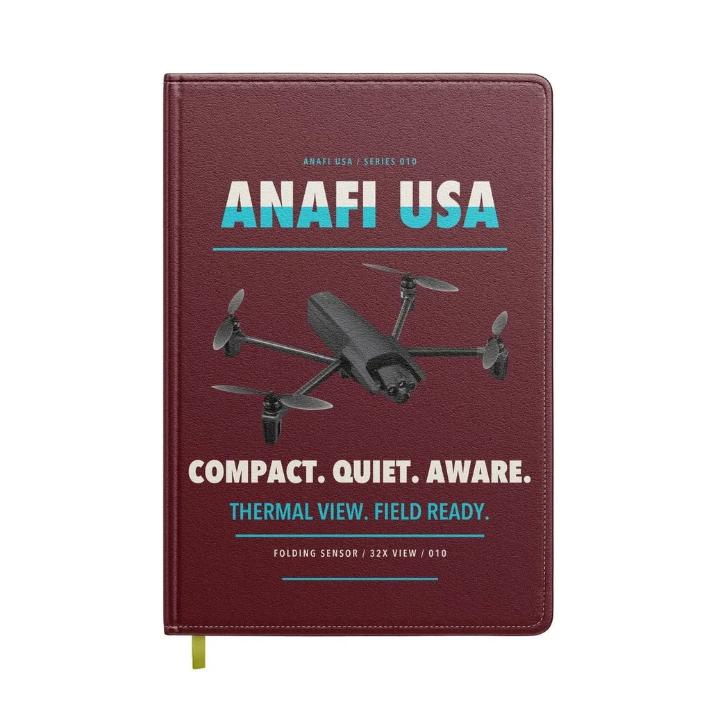 Parrot ANAFI USA design on dark red notebook