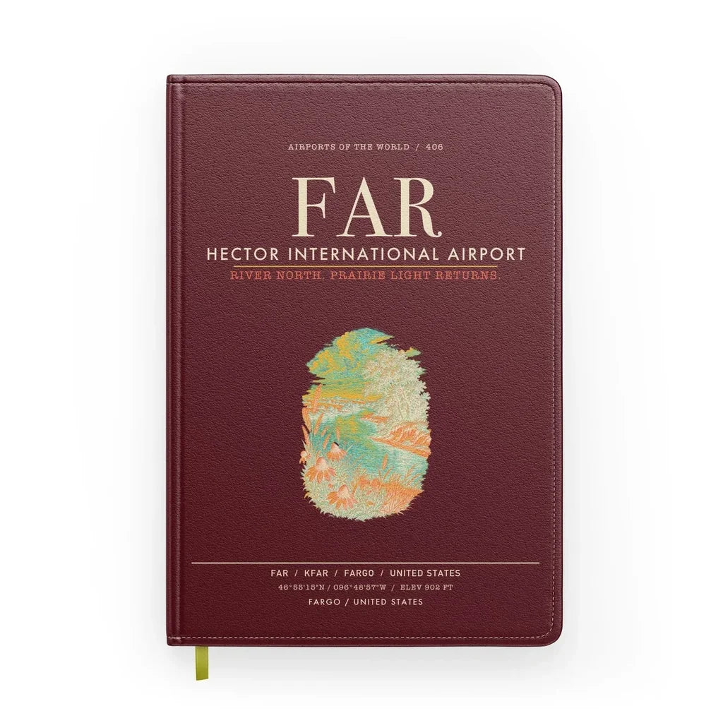 Hector International Airport (FAR) design on dark red notebook