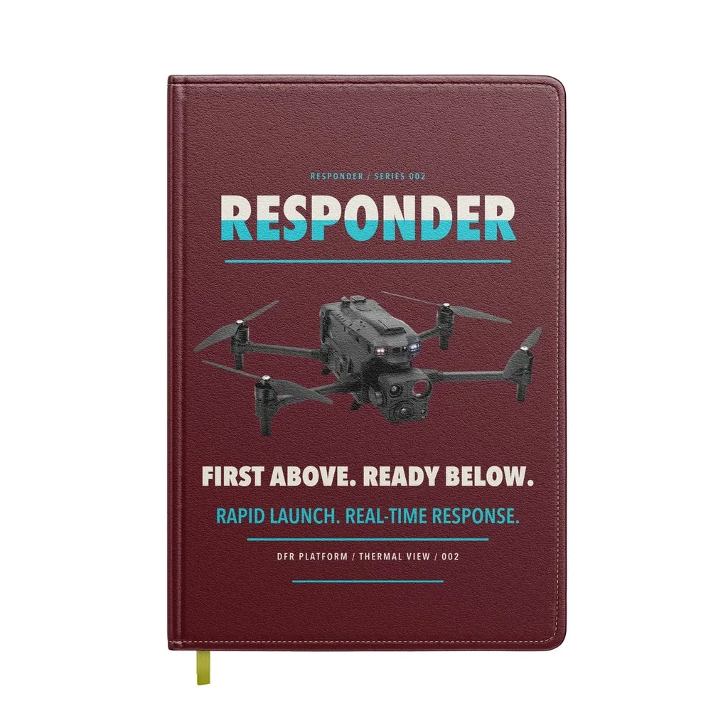 BRINC Responder design on dark red notebook
