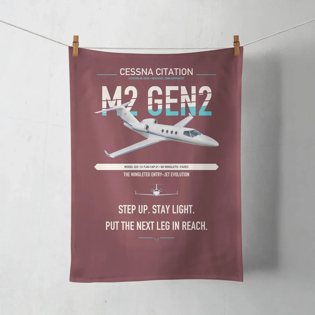 Cessna Citation M2 Gen2 design on dark red towel