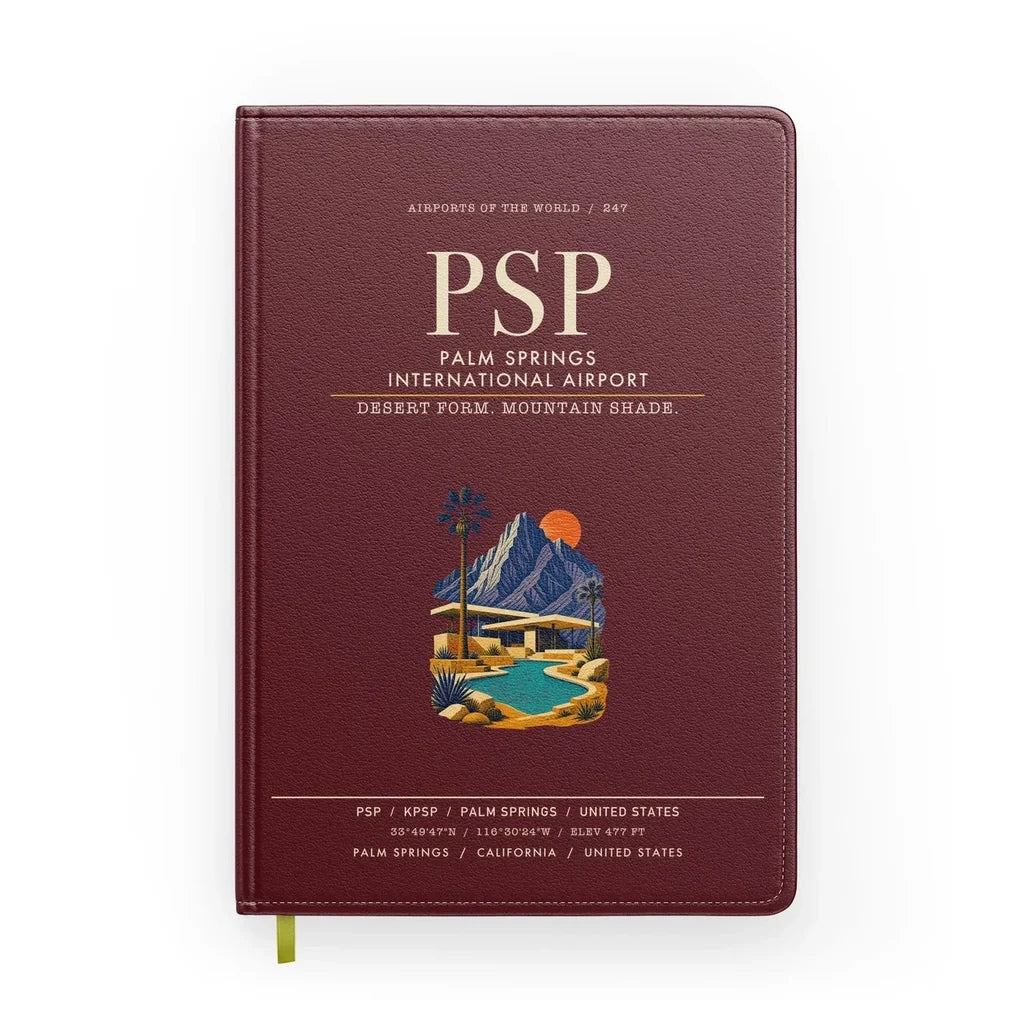 Palm Springs International Airport (PSP) design on dark red notebook