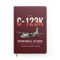 Thumbnail for C-123K Provider design on dark red notebook