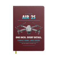 Thumbnail for DJI Air 2S design on dark red notebook