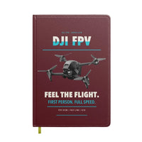 Thumbnail for DJI FPV design on dark red notebook