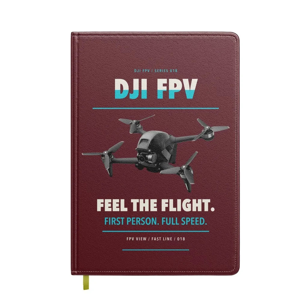 DJI FPV design on dark red notebook