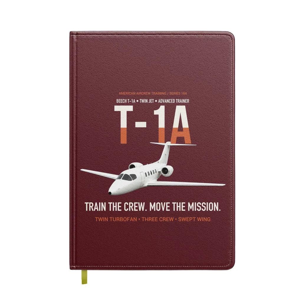 T-1A Jayhawk Advanced Jet Trainer design on dark red notebook