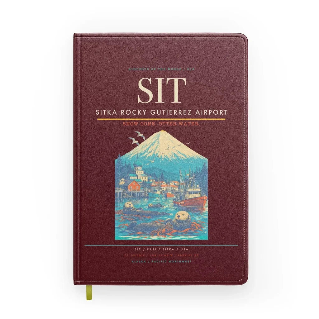 Sitka Rocky Gutierrez Airport (SIT) design on dark red notebook