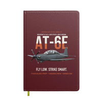 Thumbnail for AT-6E Wolverine Light Attack design on dark red notebook