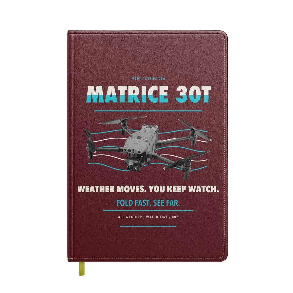 DJI Matrice 30T design on dark red notebook