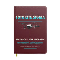 Thumbnail for Fotokite Sigma design on dark red notebook