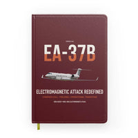 Thumbnail for EA-37B Compass Call design on dark red notebook
