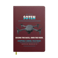 Thumbnail for ACSL SOTEN design on dark red notebook