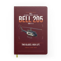 Thumbnail for Bell 205A-1++ design on dark red notebook