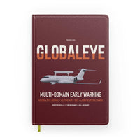 Thumbnail for Saab GlobalEye design on dark red notebook