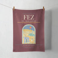 Thumbnail for Fes (FEZ) design on dark red towel