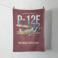 Thumbnail for Boeing P-12E design on dark red towel