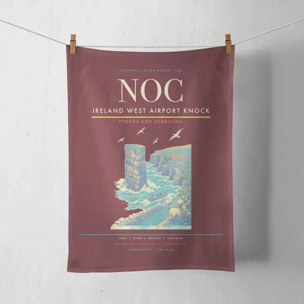 Ireland West Airport Knock (NOC) design on dark red towel
